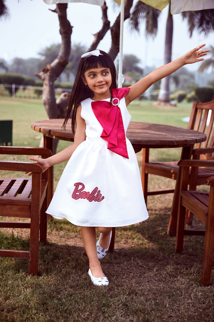 Buy Barbie White Satin Party Dress with Pink Bow for Girls
