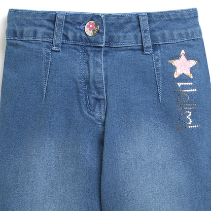 Denim Pant With Stitch Detail And Silver Foil Branding Detail.