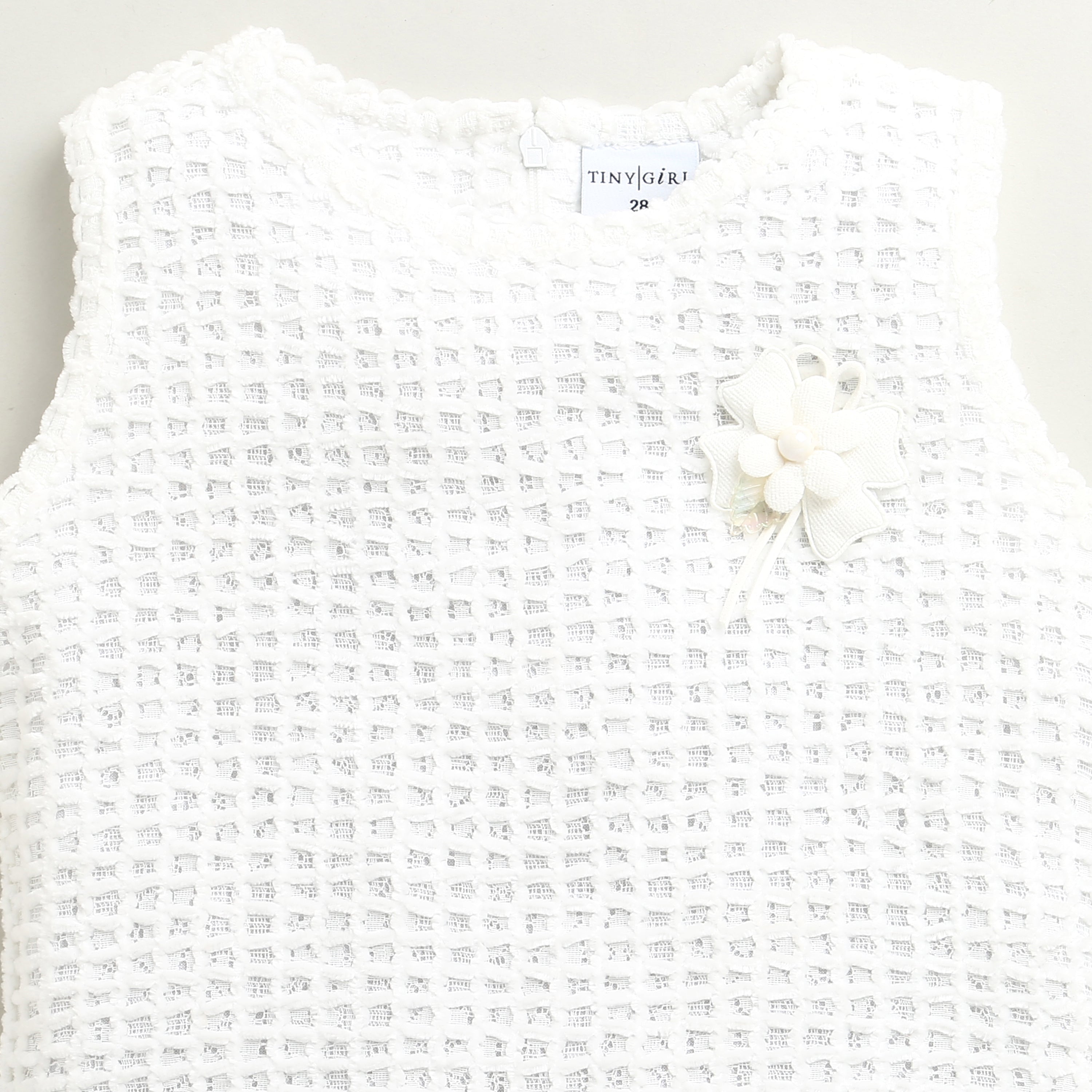 White Textured Sleeveless Top with Floral Applique TG6367
