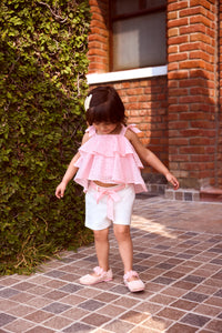 Tressel Peach Sleeveless Peplum Top With Shorts